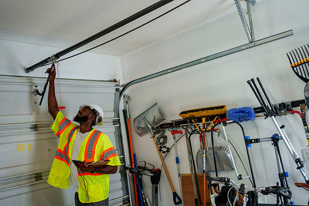 Professional Garage Door Panel Replacement technician working in Fairfax, OK